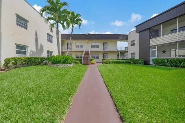 a view of a back yard of the house