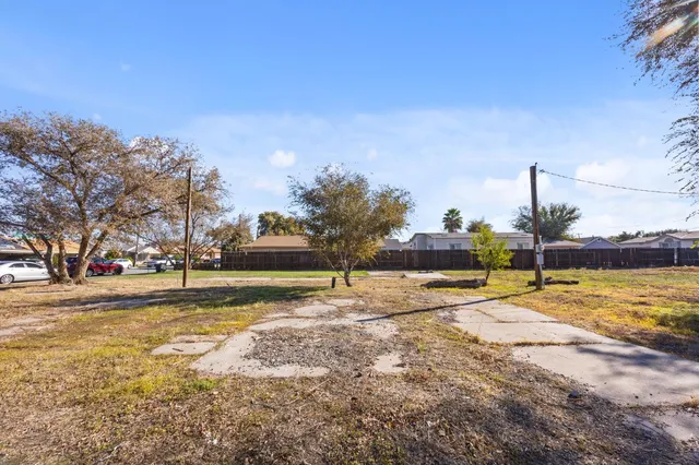 a view of a swimming pool with an outdoor space and seating area