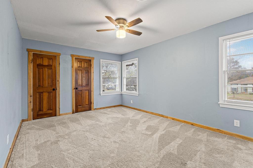 531 West Bullock Street Denison, TX 75020 - Photo 15 of 28 a view of an empty room with a window