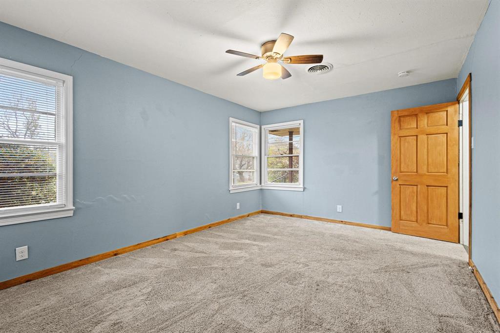 531 West Bullock Street Denison, TX 75020 - Photo 17 of 28 a view of an empty room with a window