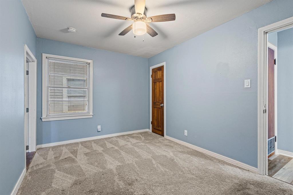 531 West Bullock Street Denison, TX 75020 - Photo 21 of 28 a view of an empty room with a window