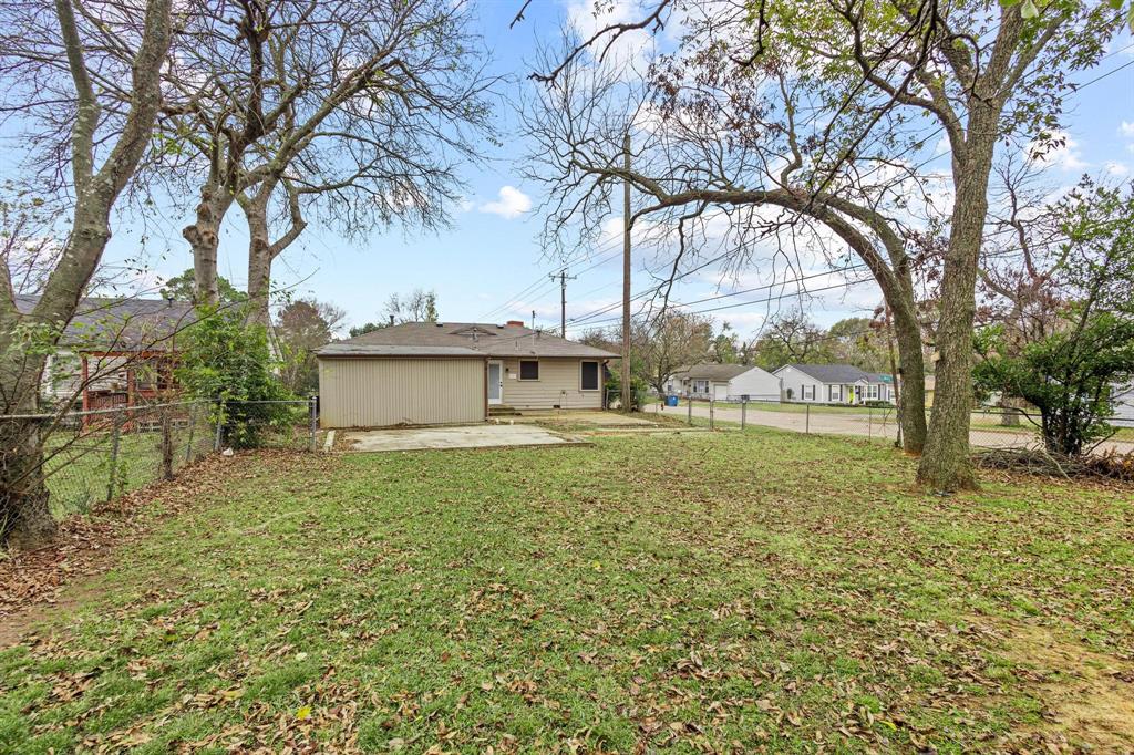 531 West Bullock Street Denison, TX 75020 - Photo 28 of 28 a view of a house with a yard