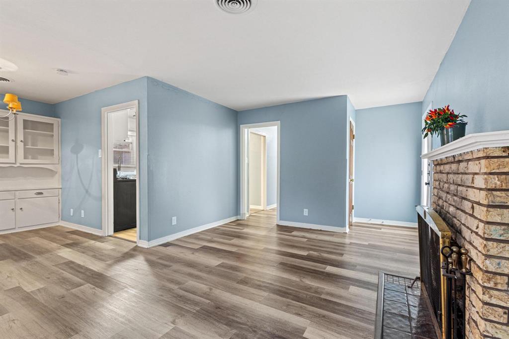 531 West Bullock Street Denison, TX 75020 - Photo 7 of 28 a view of an empty room with closet and a window