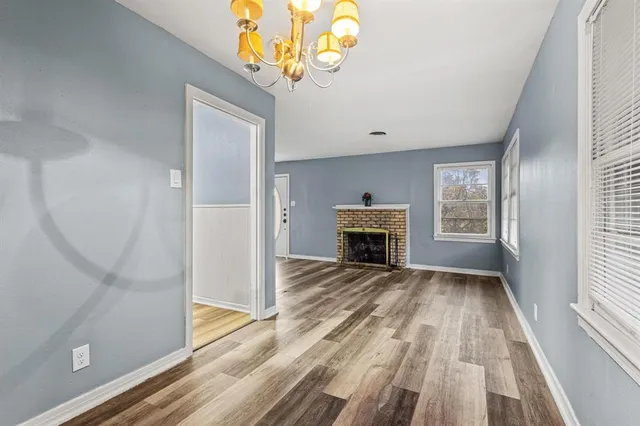 wooden floor with fireplace in livingroom with wooden floor