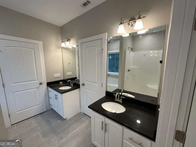 an empty room with a empty space and a window