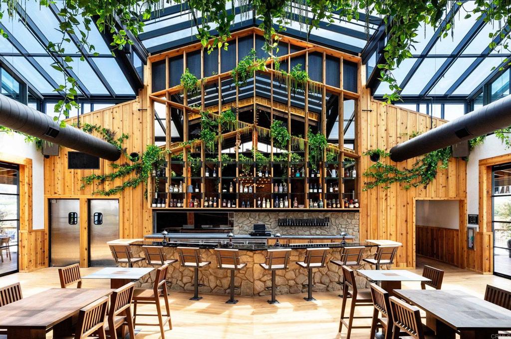 1303 Bergamo Encinitas, CA 92024 - Photo 16 of 21 a front view of a building with sitting area