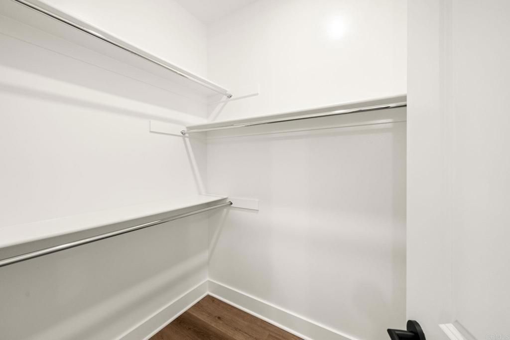 1303 Bergamo Encinitas, CA 92024 - Photo 9 of 21 a view of small space with empty racks