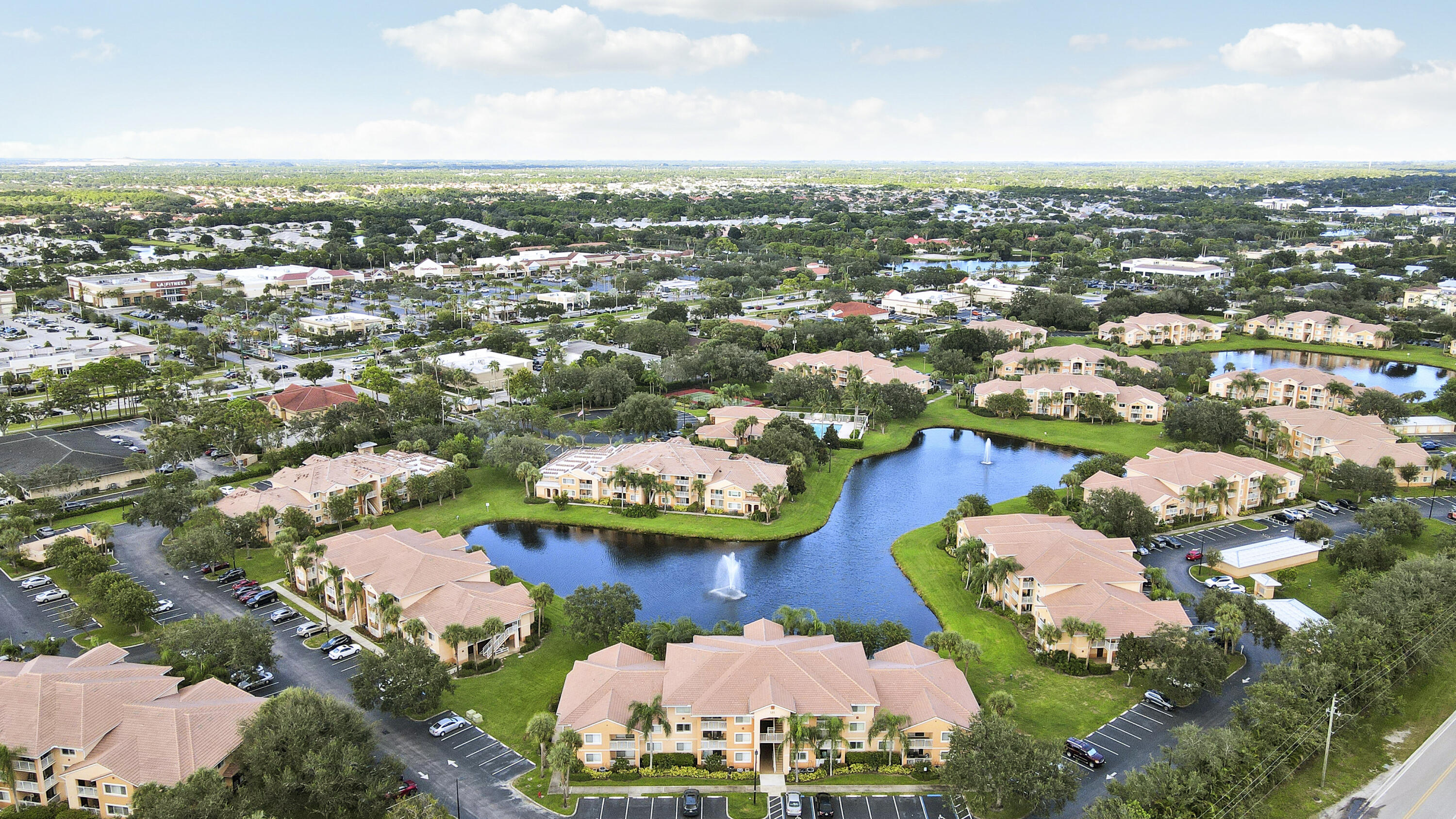 251 Southwest Palm Drive, Unit 204 Port St. Lucie, FL 34986 - Photo 13 of 14 an aerial view of a residential houses with outdoor space