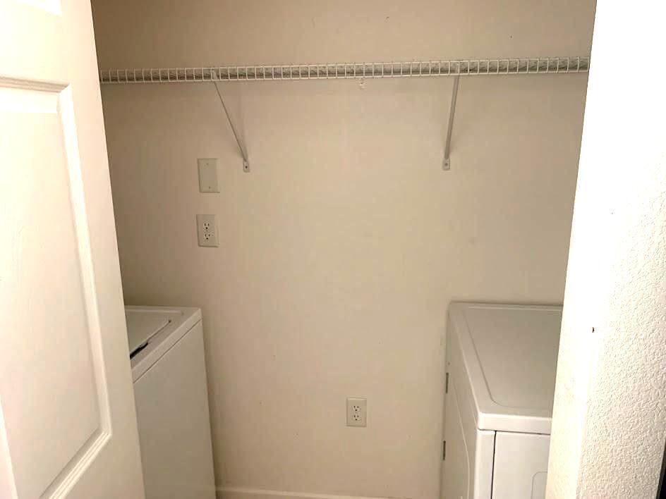 251 Southwest Palm Drive, Unit 204 Port St. Lucie, FL 34986 - Photo 3 of 14 a bathroom with a glass shower door