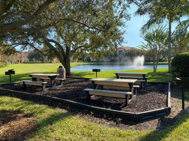 a view of a hallway with seating area