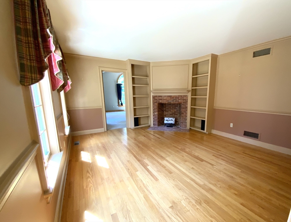 5 Pocumtuck Drive Deerfield, MA 01373 - Photo 17 of 42 a view of empty room with fireplace and dryer