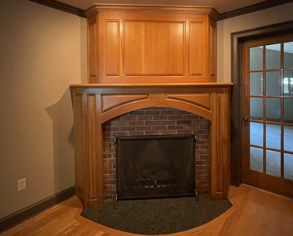 5 Pocumtuck Drive Deerfield, MA 01373 - Photo 19 of 42 a close view of a fireplace in wooden floor