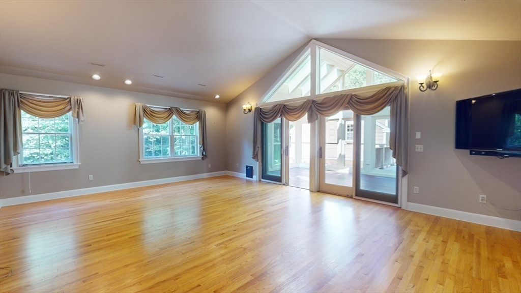 5 Pocumtuck Drive Deerfield, MA 01373 - Photo 23 of 42 an empty room with wooden floor and windows