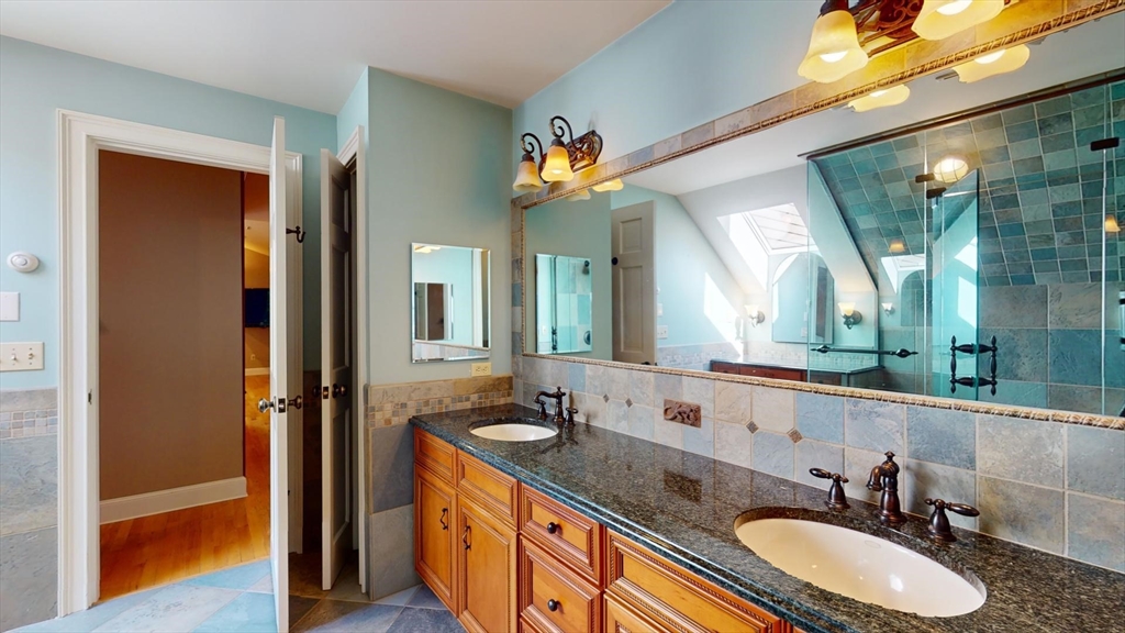 5 Pocumtuck Drive Deerfield, MA 01373 - Photo 26 of 42 a bathroom with a sink double vanity granite and a mirror