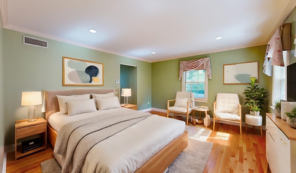 5 Pocumtuck Drive Deerfield, MA 01373 - Photo 31 of 42 a bedroom with a bed and wooden floor