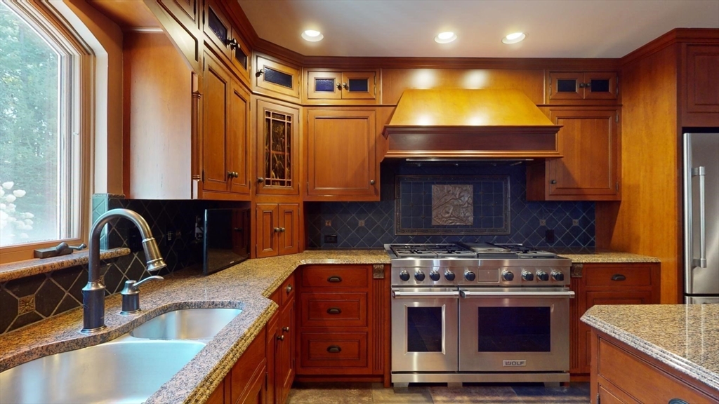 5 Pocumtuck Drive Deerfield, MA 01373 - Photo 6 of 42 a kitchen with granite countertop a stove and a sink