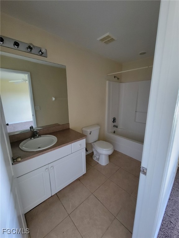 668 Homestead Road South Lehigh Acres, FL 33974 - Photo 7 of 11 a bathroom with a sink and a mirror
