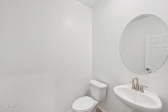 a view of a room with gym equipment and a window