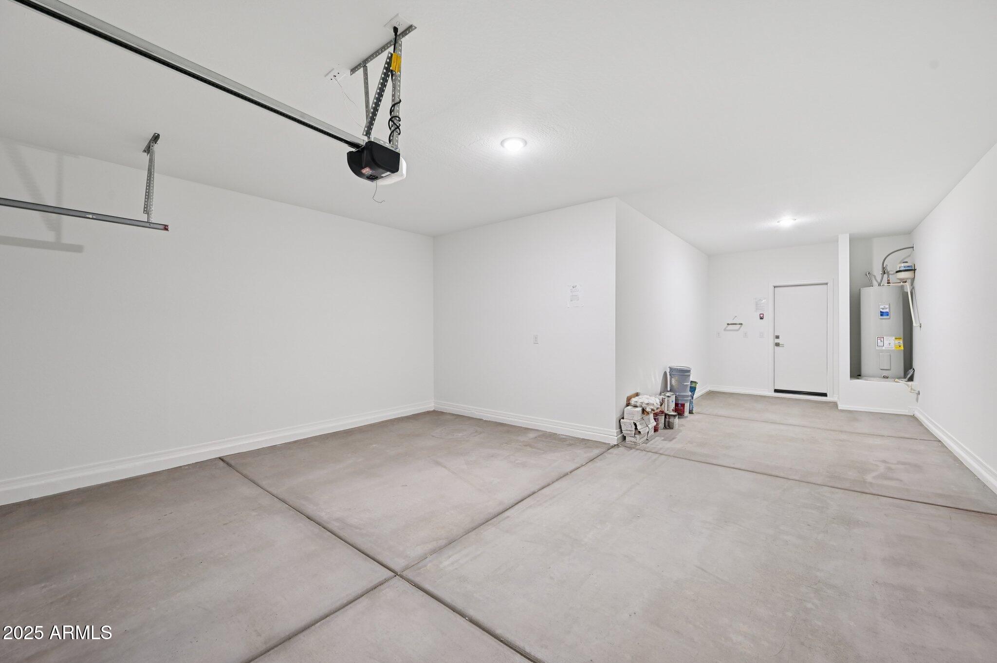 5535 South 240th Lane Buckeye, AZ 85326 - Photo 16 of 57 a view of a room with gym equipment and a window