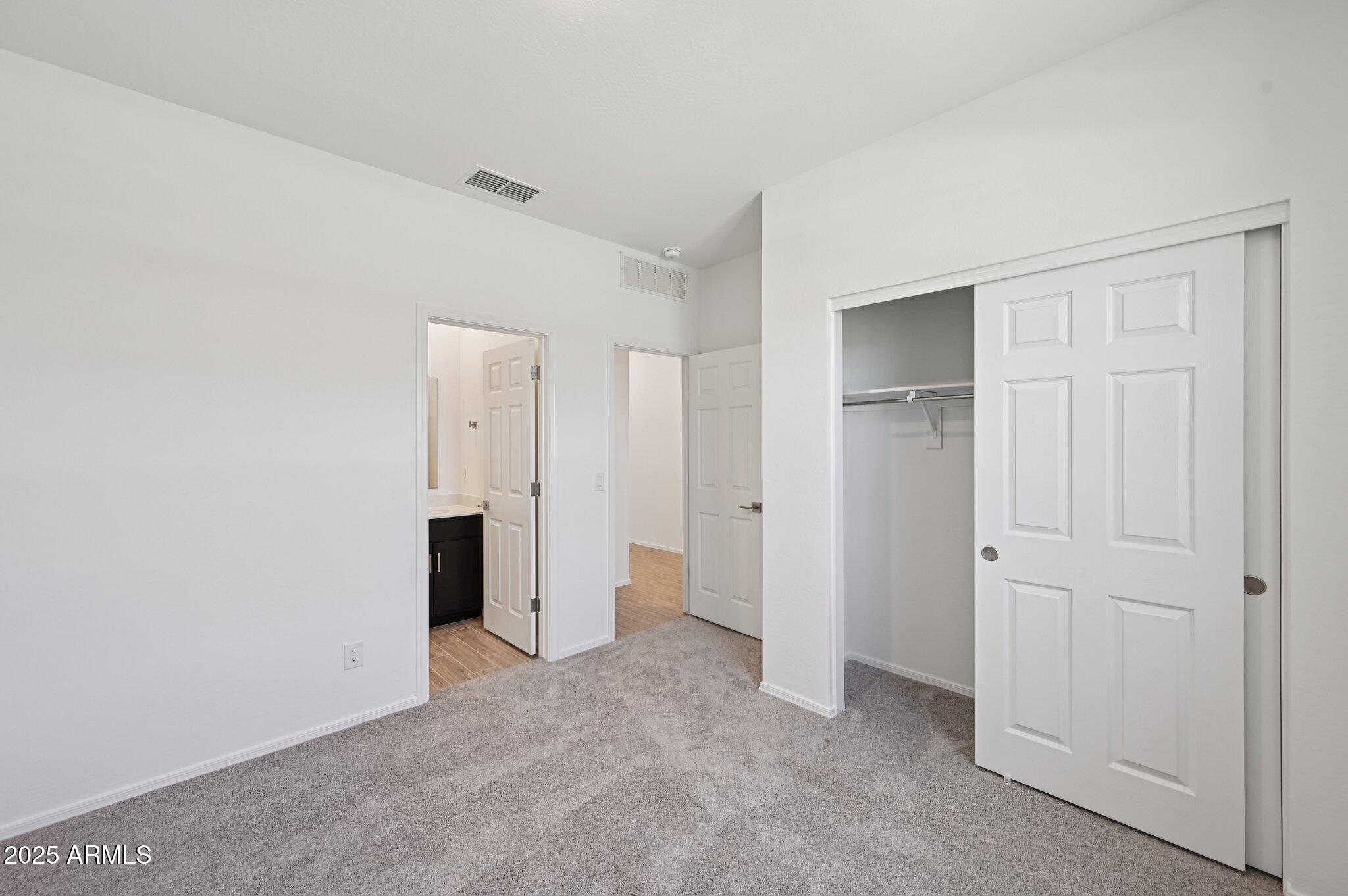 5535 South 240th Lane Buckeye, AZ 85326 - Photo 19 of 57 a view of an empty room