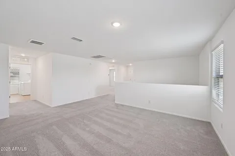 a bathroom with a sink and a window