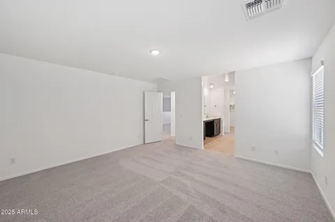 a bathroom with a sink double vanity and a mirror