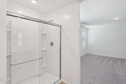 a view of an empty walk in closet