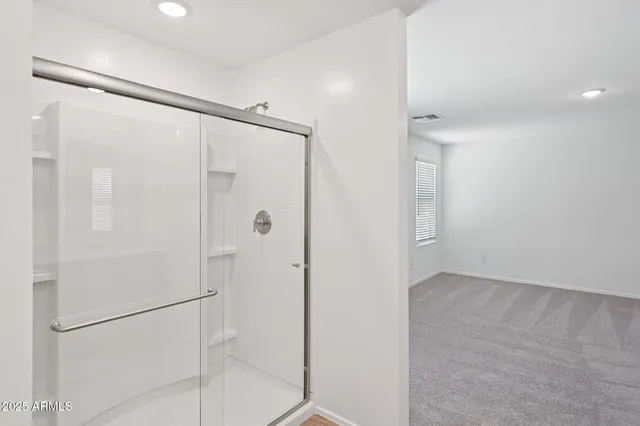 a view of an empty walk in closet