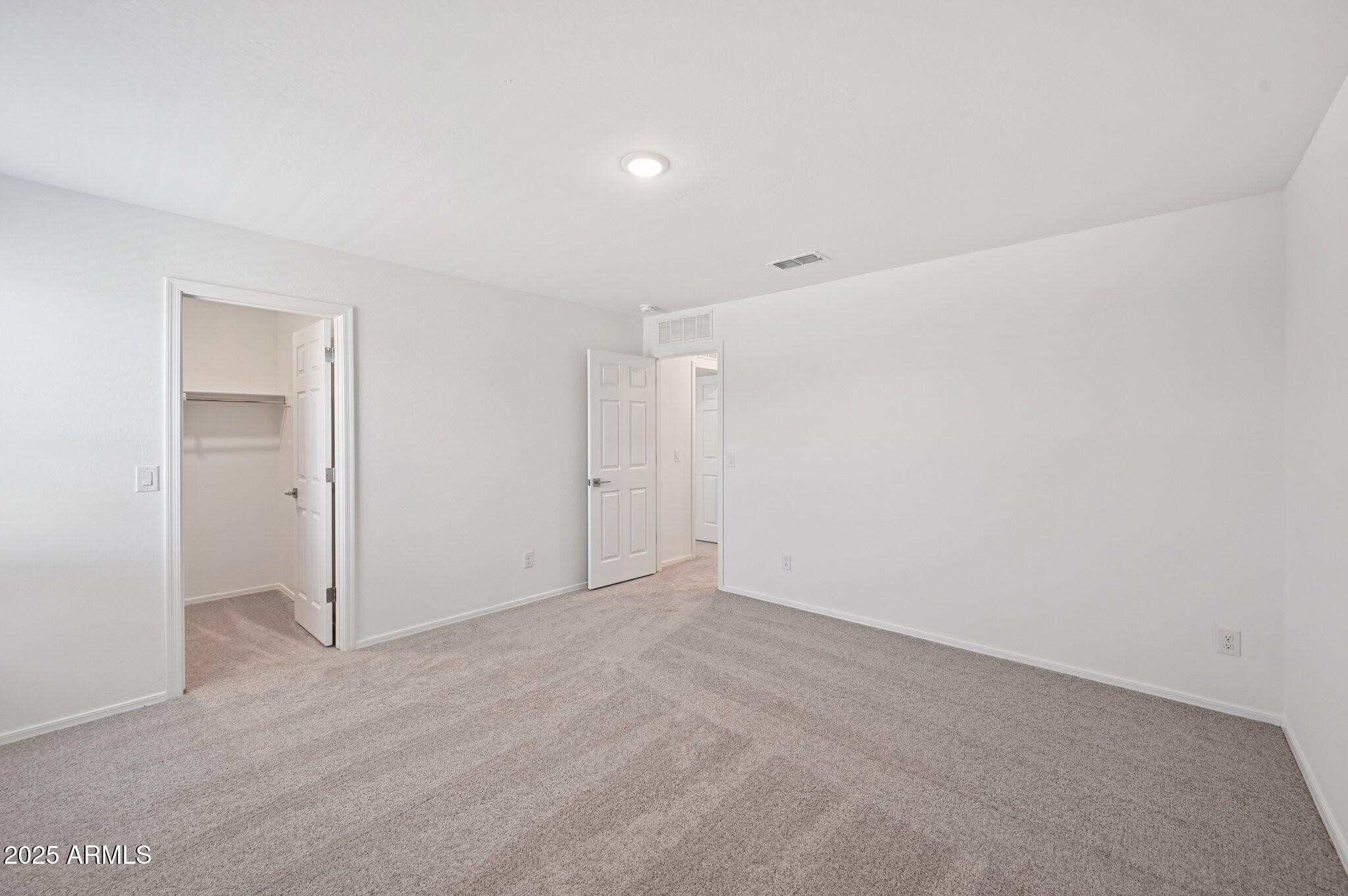 5535 South 240th Lane Buckeye, AZ 85326 - Photo 34 of 57 a view of an empty room