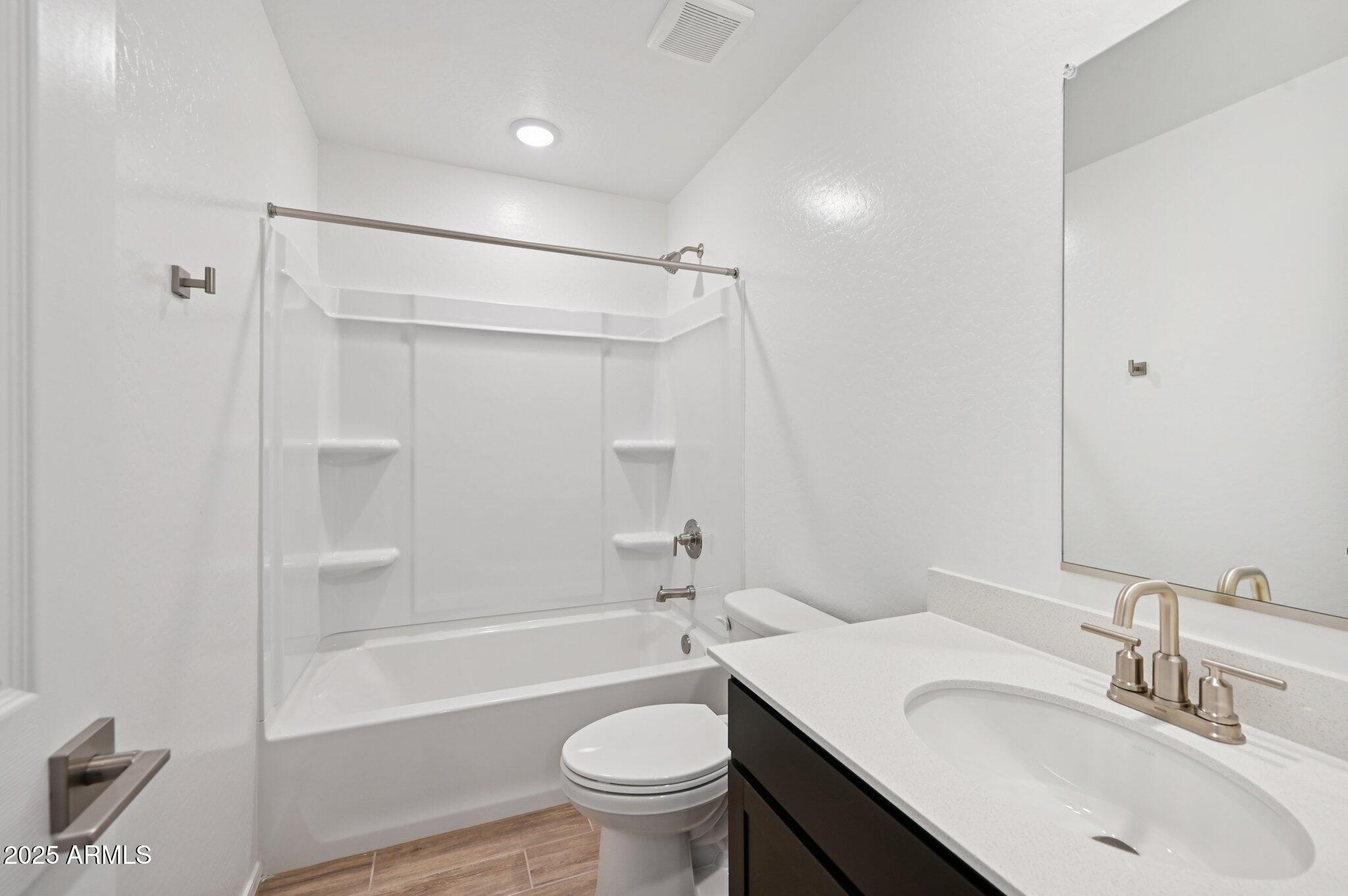 5535 South 240th Lane Buckeye, AZ 85326 - Photo 35 of 57 a bathroom with a sink toilet and shower
