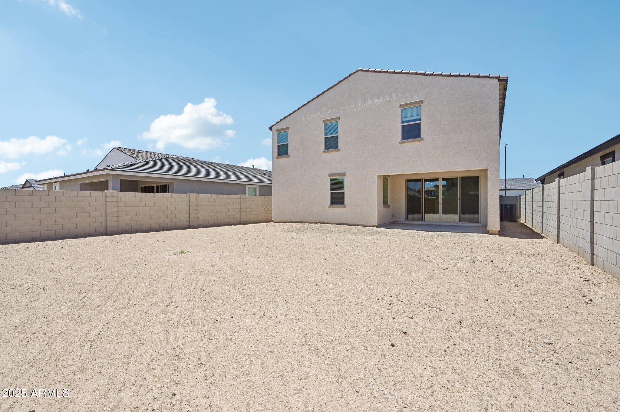 5535 South 240th Lane Buckeye, AZ 85326 - Photo 40 of 57 a front view of a house with a outdoor space