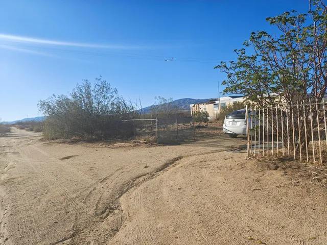 a view of a street with an empty space
