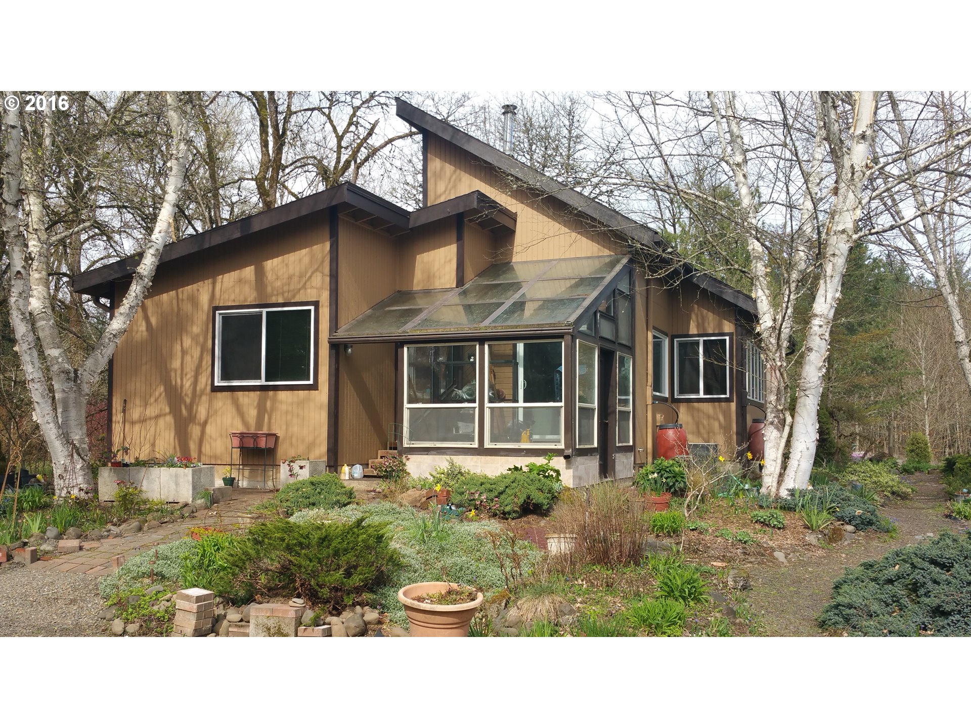 10970 South Mulino Road Canby, OR 97013 - Photo 1 of 32 a house view with a outdoor space