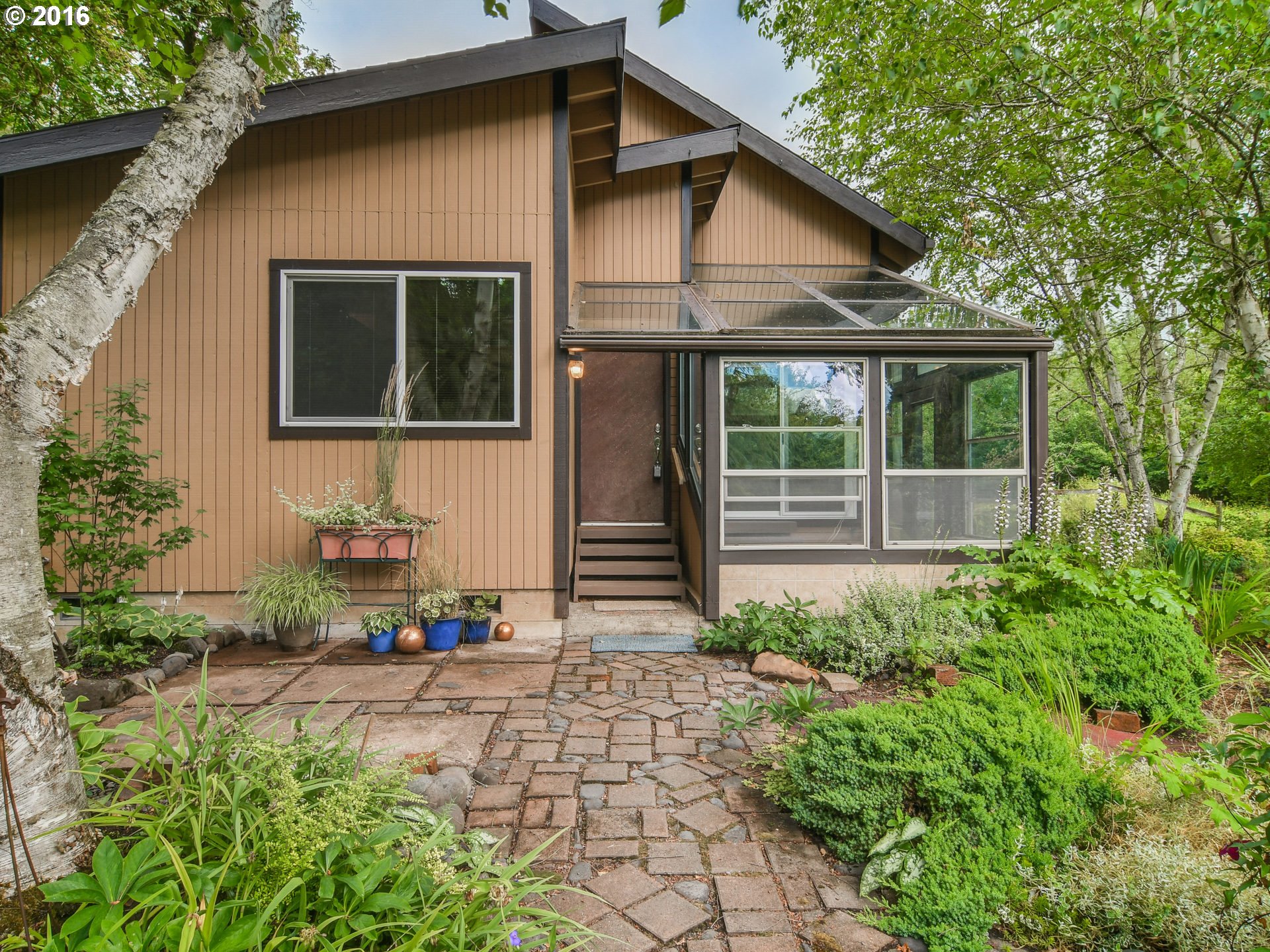 10970 South Mulino Road Canby, OR 97013 - Photo 2 of 32 a view of house with backyard and glass windows