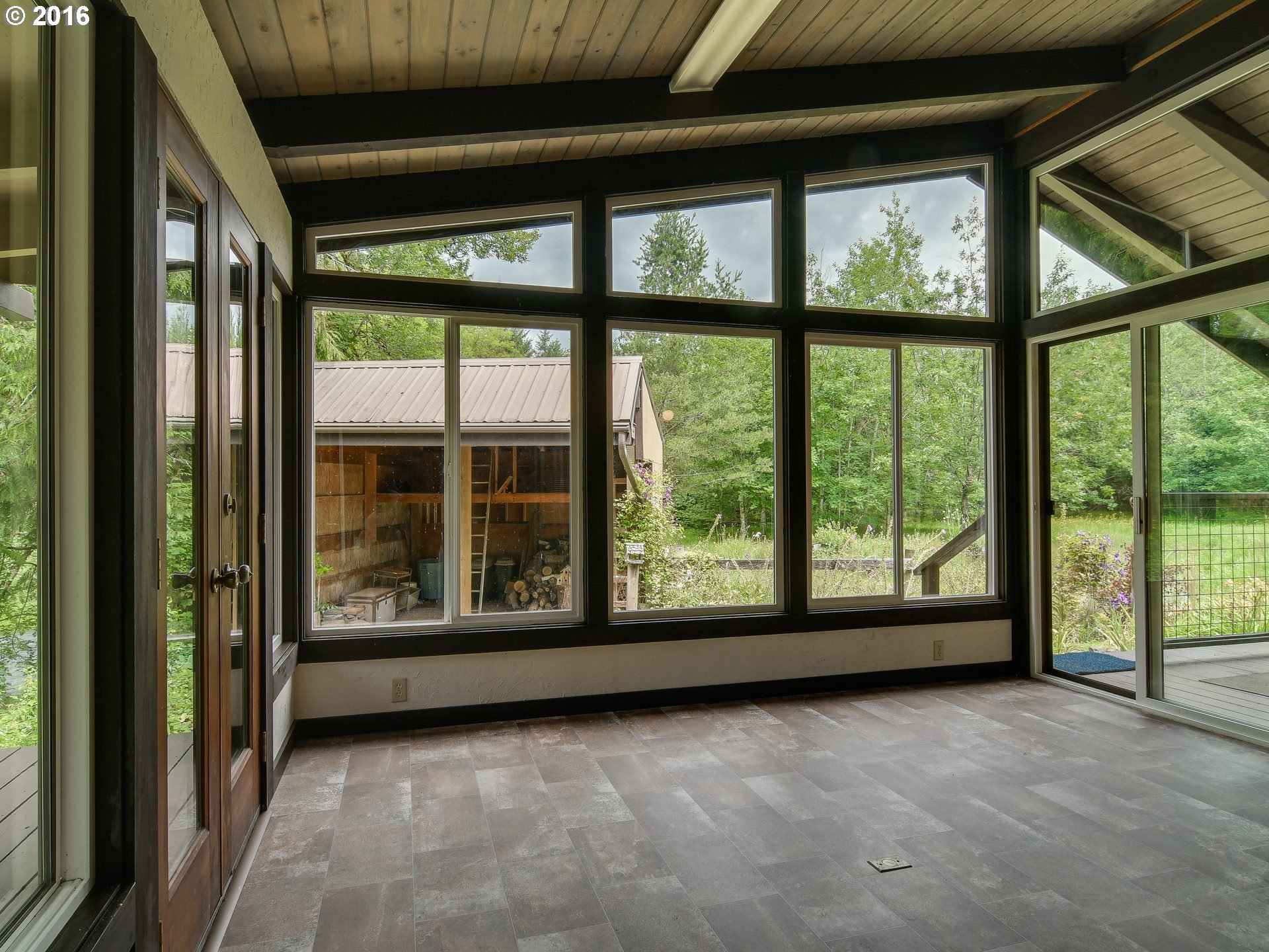 10970 South Mulino Road Canby, OR 97013 - Photo 23 of 32 a view of a room with large windows and city view