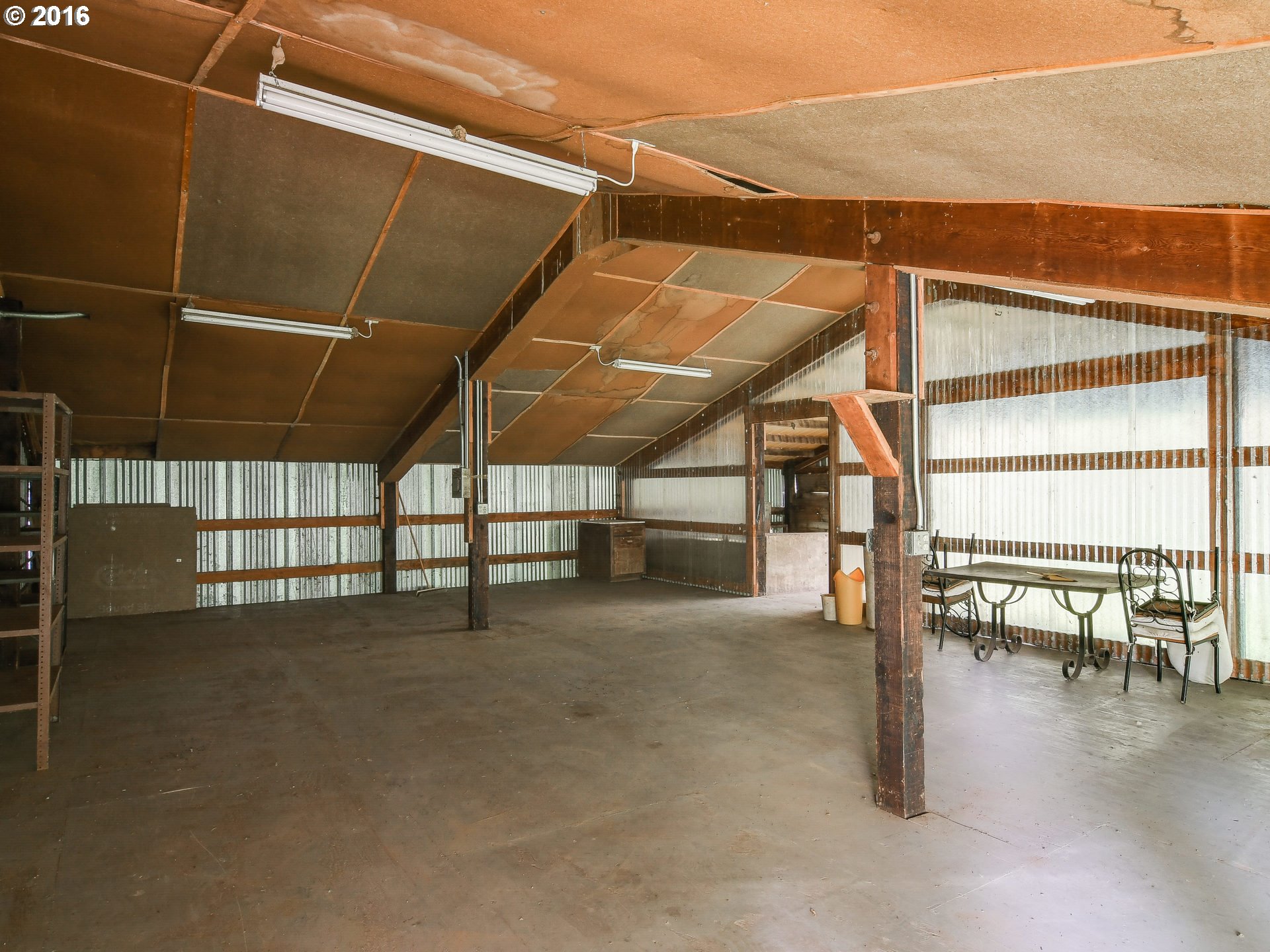 10970 South Mulino Road Canby, OR 97013 - Photo 28 of 32 a view of empty room with wooden floor