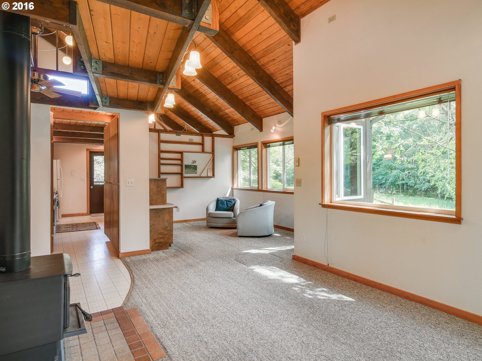 10970 South Mulino Road Canby, OR 97013 - Photo 6 of 32 a living room with furniture and a large window