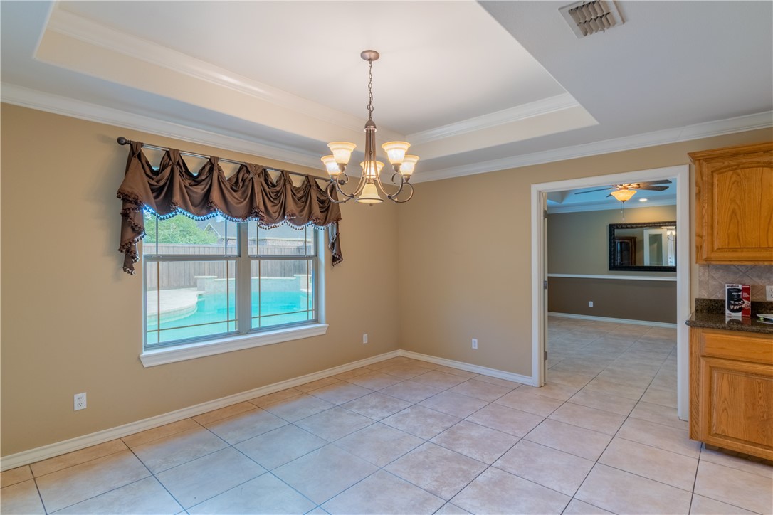 1904 Santa Rosa Drive Alice, TX 78332 - Photo 8 of 34 a view of an empty room with window and cabinet