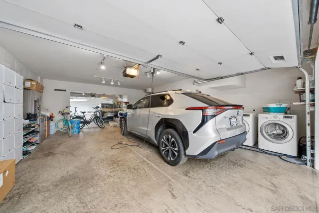 a view of a garage and car parked