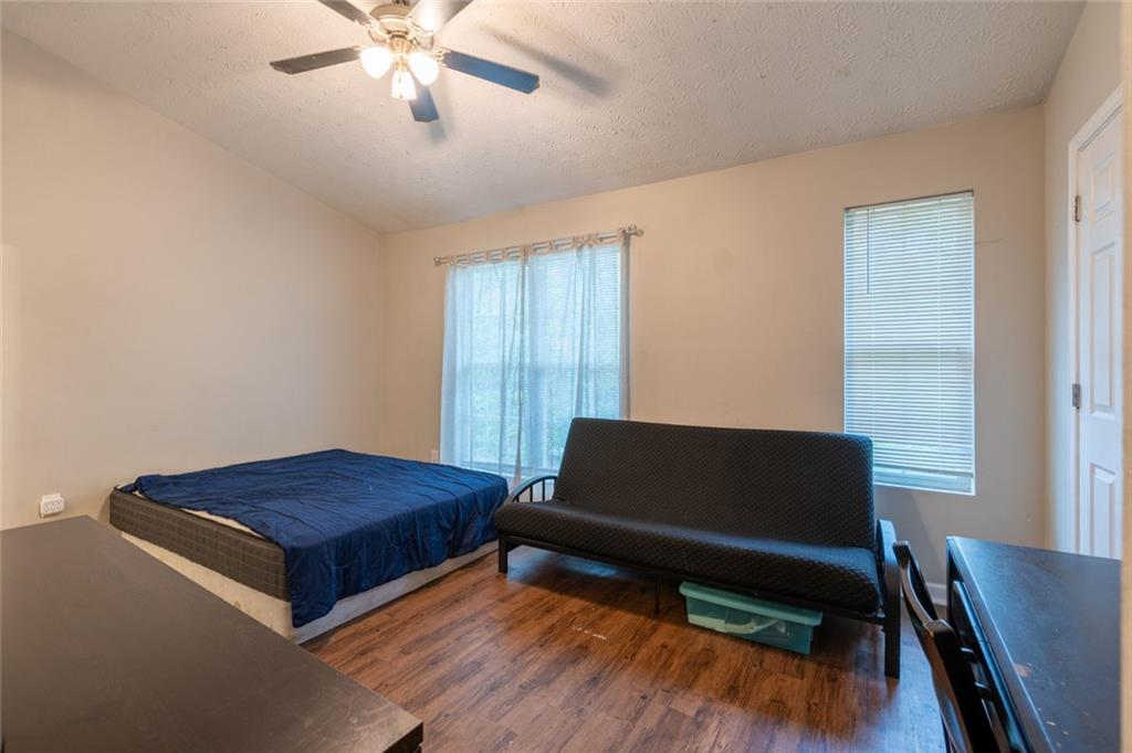 3474 Waldrop Trail Decatur, GA 30034 - Photo 14 of 17 a living room with a bed furniture and a window