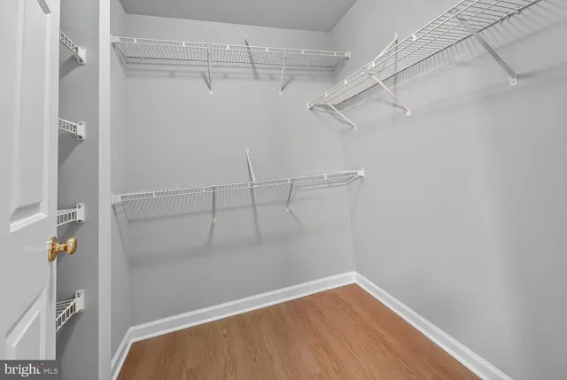 a view of a room with racks on the wall
