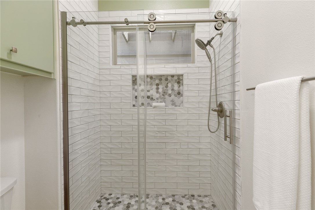 2833 Persimmon Ridge Court Bryan, TX 77807 - Photo 46 of 50 a bathroom with a shower
