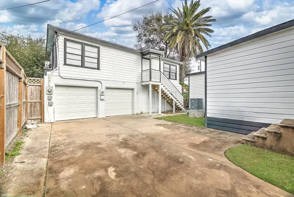 a view of a backyard of a house