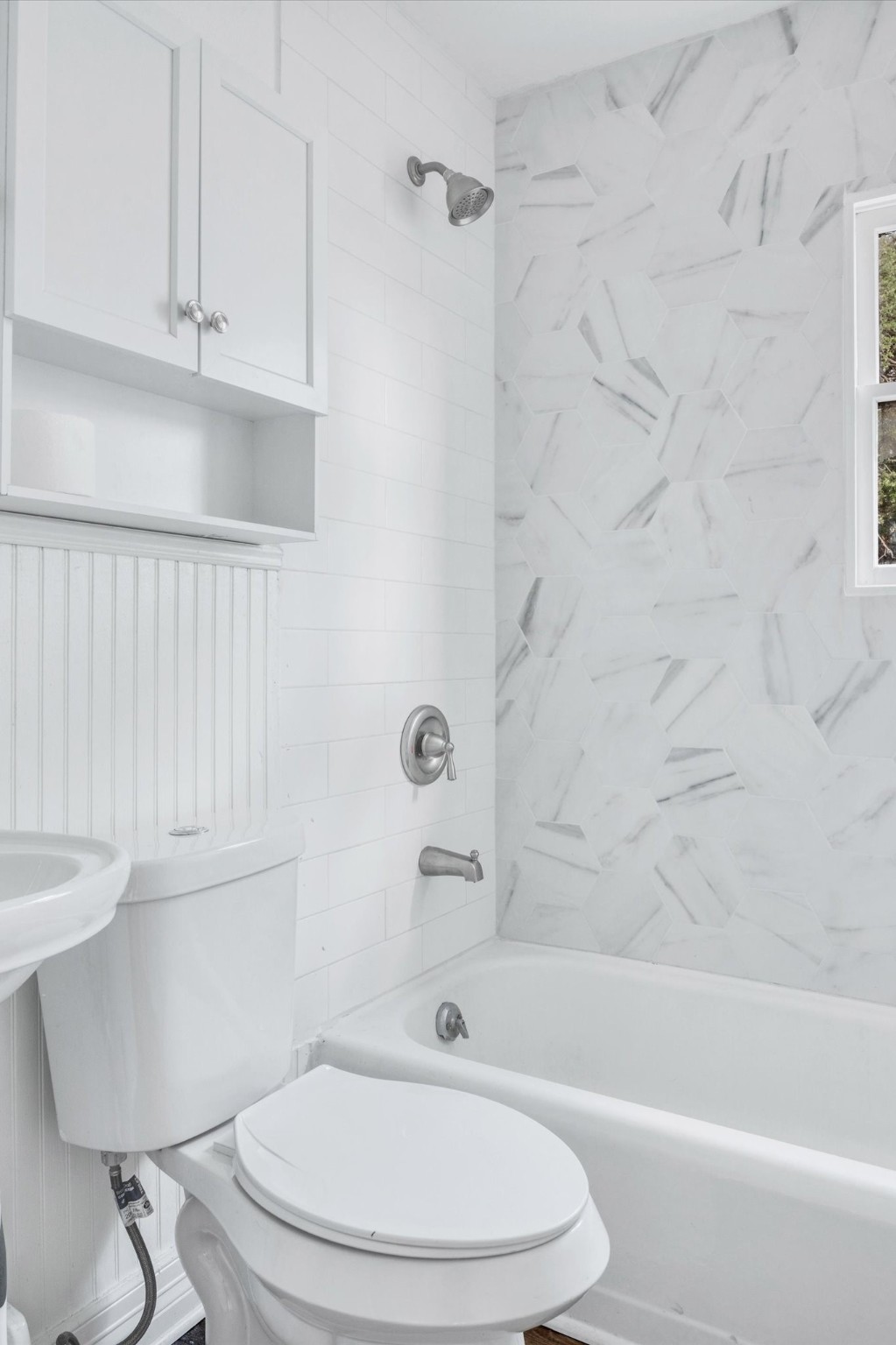 4006 Avenue R 1/2 Rear Galveston, TX 77550 - Photo 17 of 26 a bathroom with a toilet and a bathtub