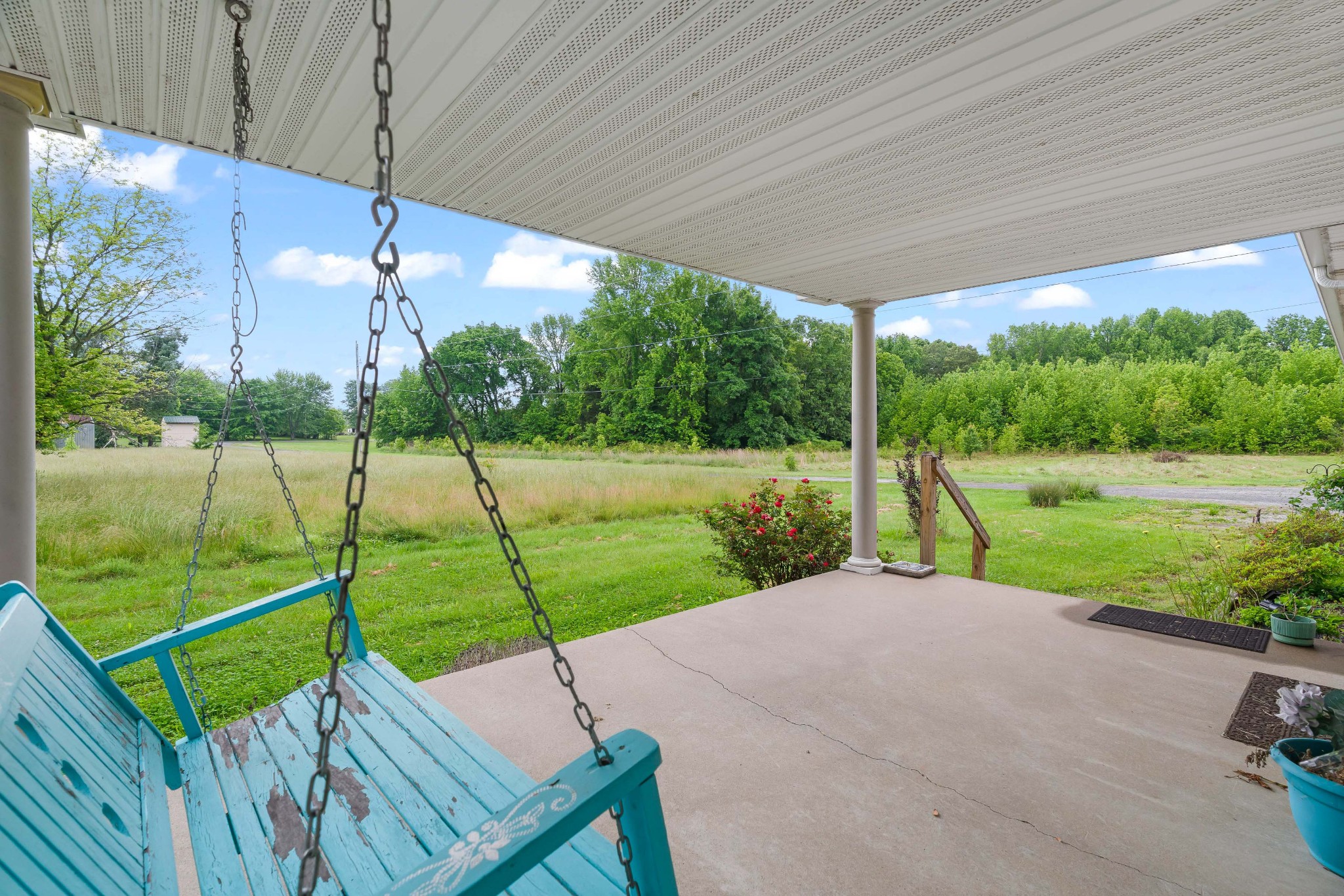 6842 Williams Road Cross Plains, TN 37049 - Photo 14 of 56 a view of a garden with an outdoor seating