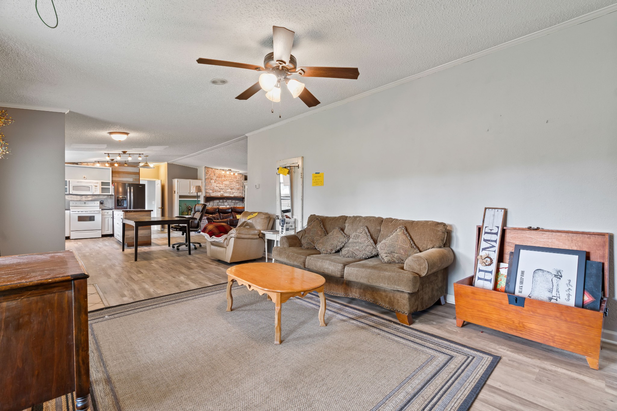 6842 Williams Road Cross Plains, TN 37049 - Photo 18 of 56 a living room with furniture and wooden floor