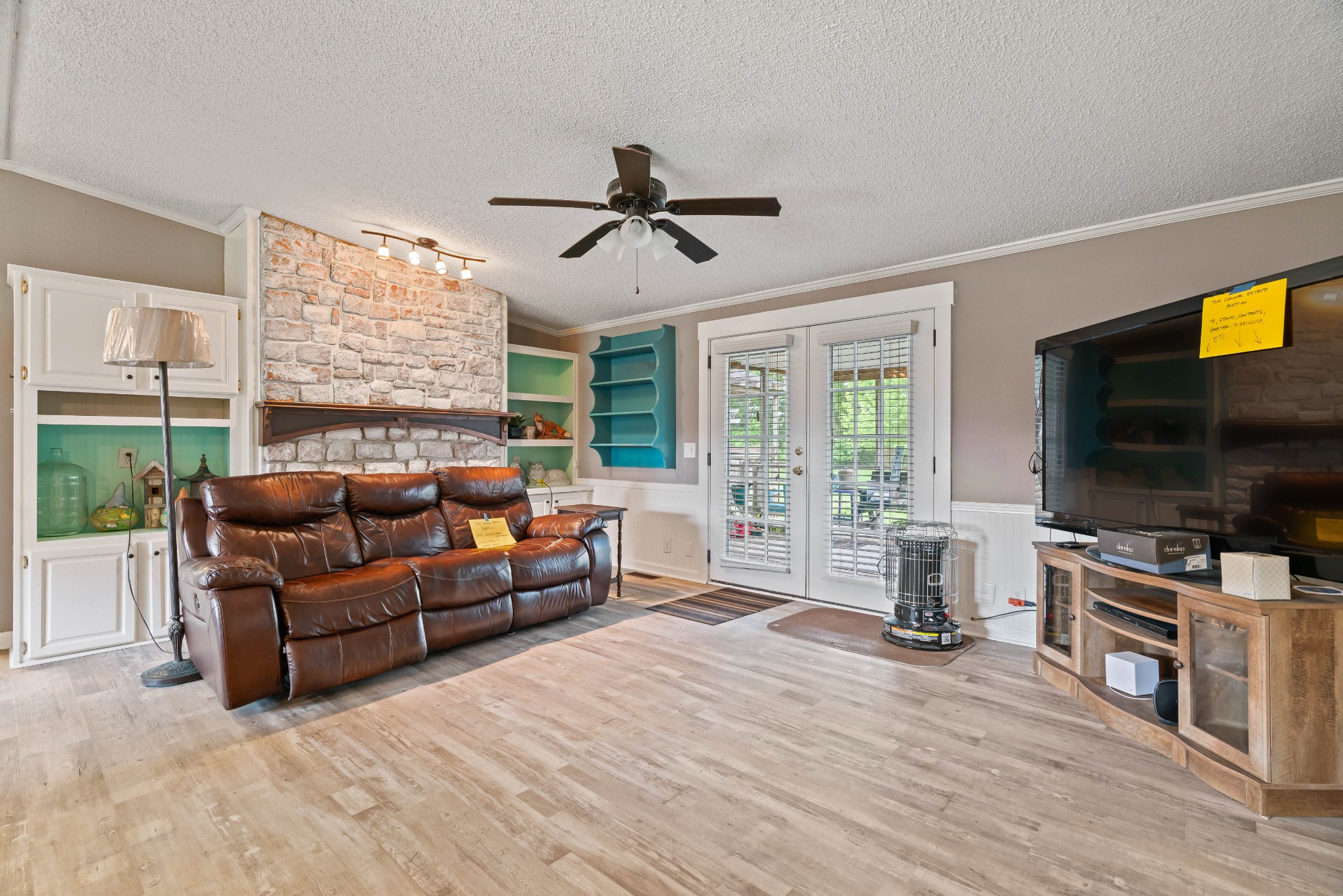 6842 Williams Road Cross Plains, TN 37049 - Photo 28 of 56 a living room with furniture and a flat screen tv