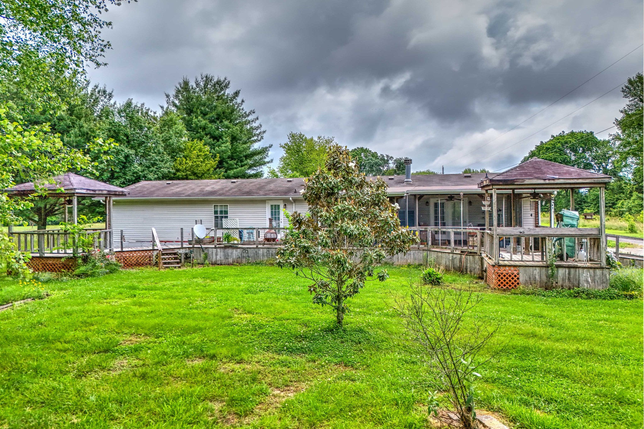 6842 Williams Road Cross Plains, TN 37049 - Photo 3 of 56 a front view of house with yard and green space