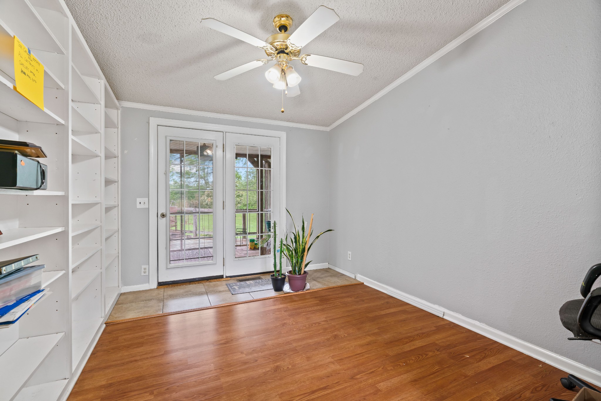 6842 Williams Road Cross Plains, TN 37049 - Photo 34 of 56 a view of an empty room with a window and wooden floor