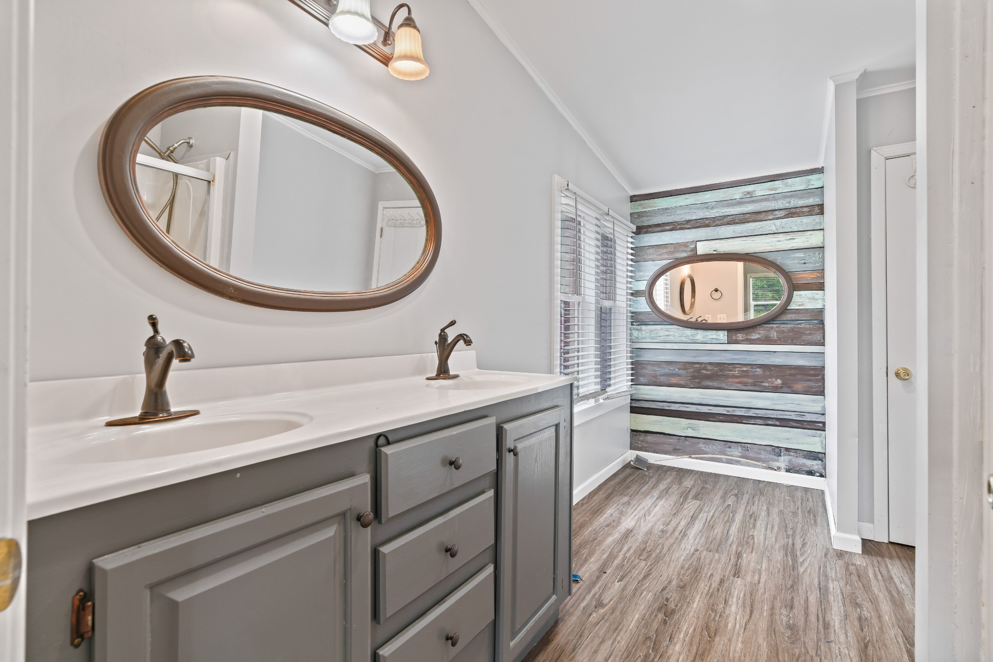 6842 Williams Road Cross Plains, TN 37049 - Photo 36 of 56 a bathroom with a sink and a mirror